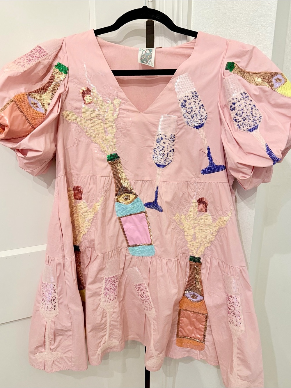 QUEEN OF SPARKLES Pink Sequin Champagne Bottle Mini Dress